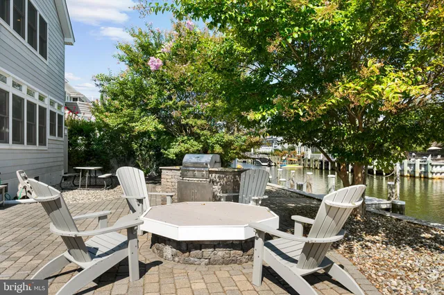 an aerial view of a house with a garden space