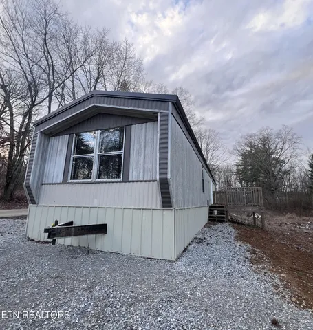 a view of balcony with wooden floor