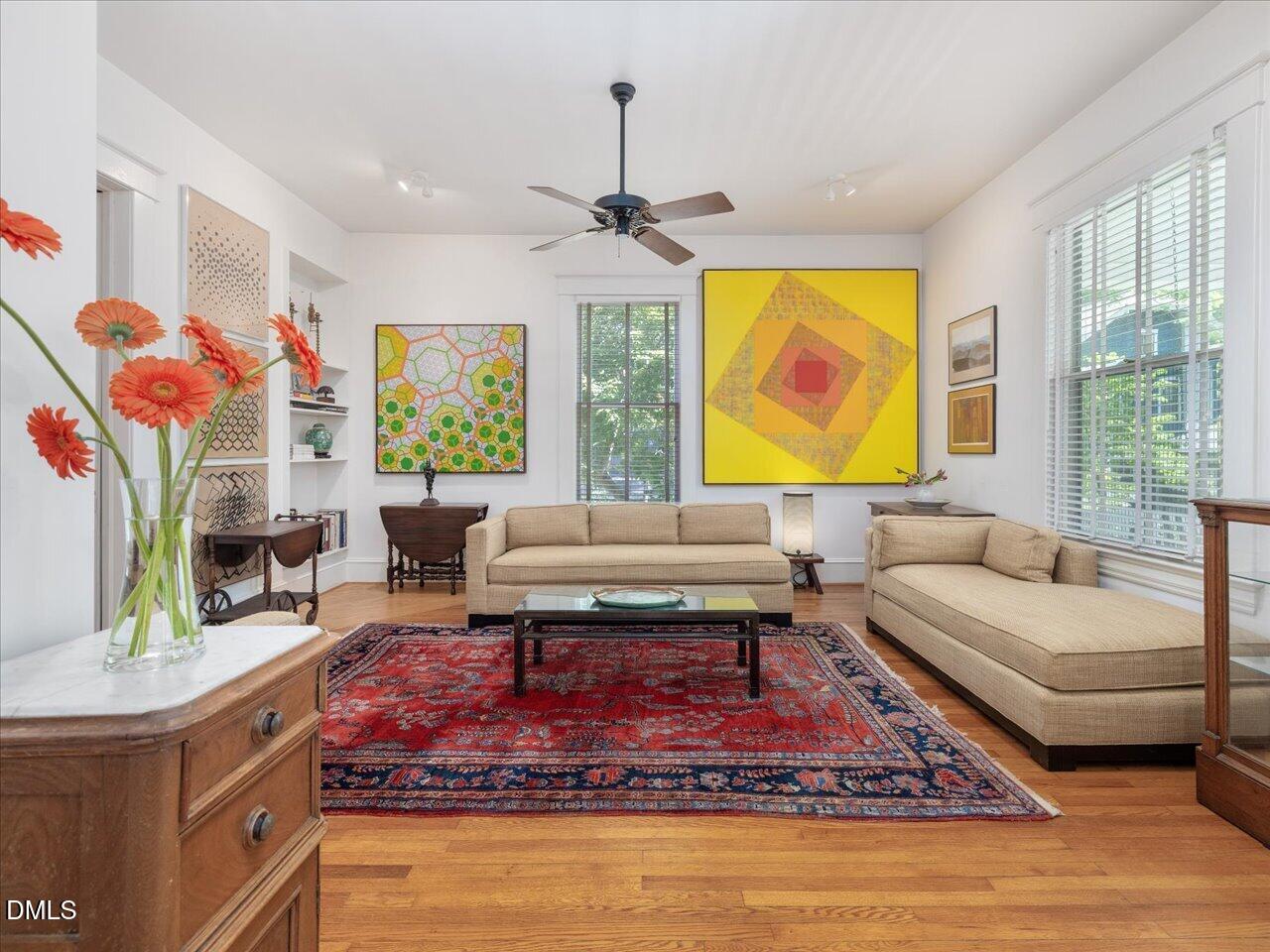 215 Hillcrest Road Raleigh, NC 27605 - Photo 27 of 97 a living room with furniture and a fireplace