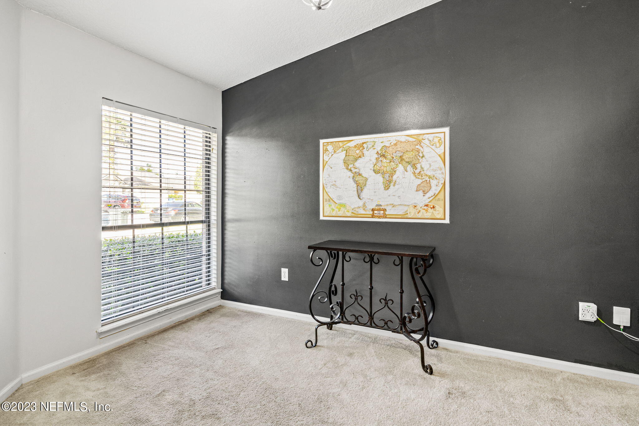 944 North Lilac Loop St. Johns, FL 32259 - Photo 11 of 32 a view of a workspace with furniture and a window