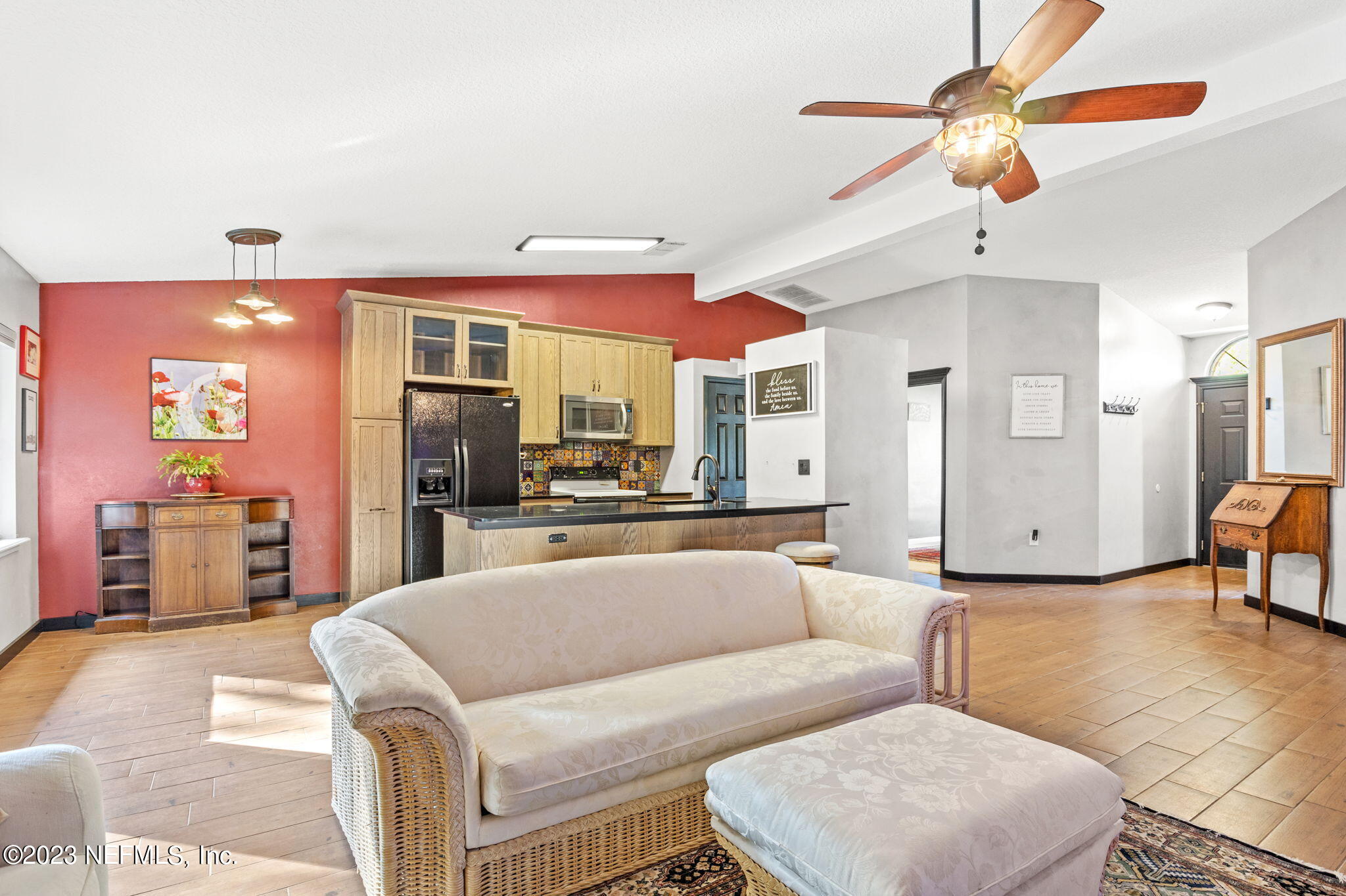 944 North Lilac Loop St. Johns, FL 32259 - Photo 13 of 32 a living room with furniture and a large window