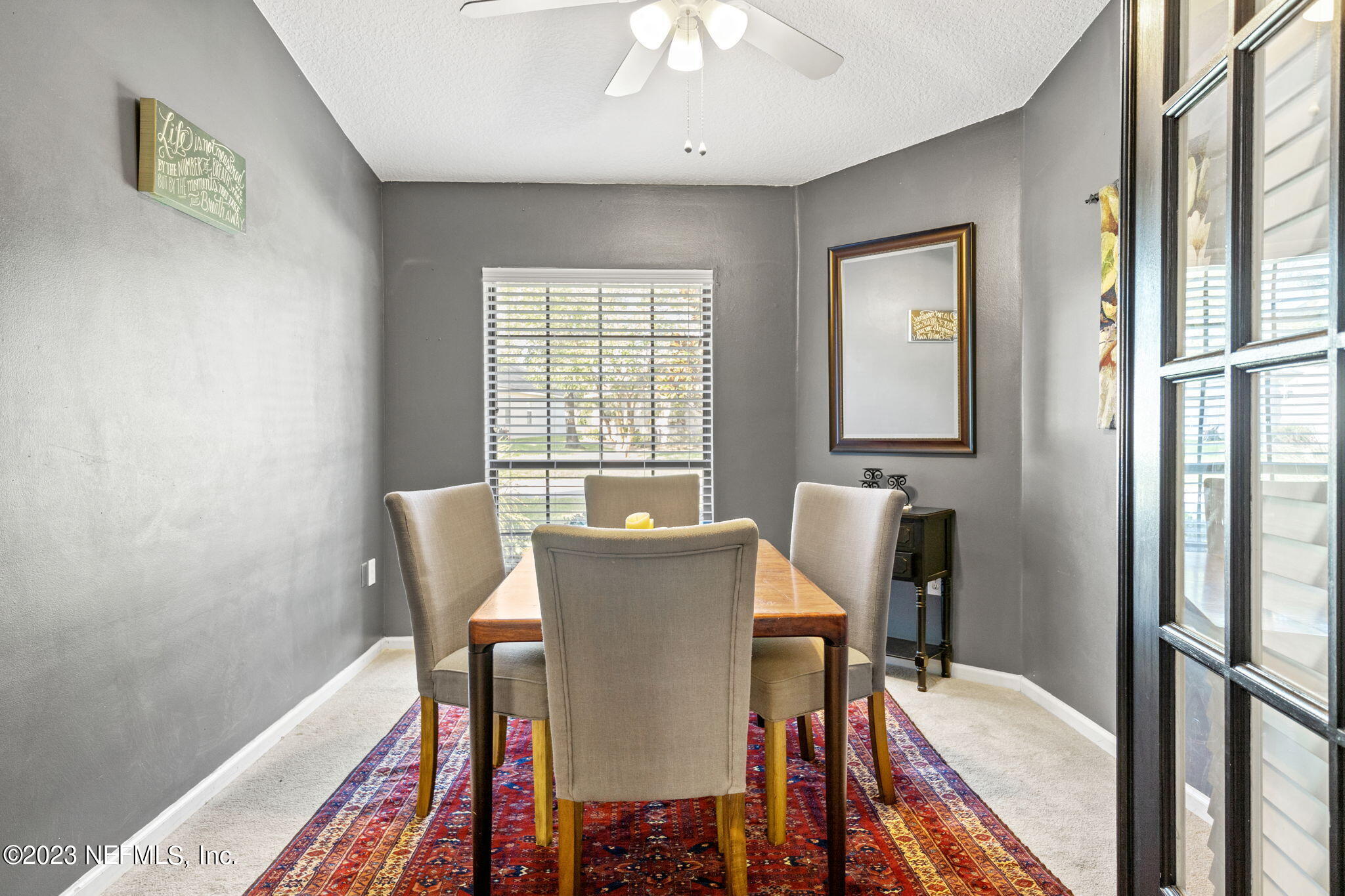 944 North Lilac Loop St. Johns, FL 32259 - Photo 14 of 32 a view of a dining room with furniture and a window