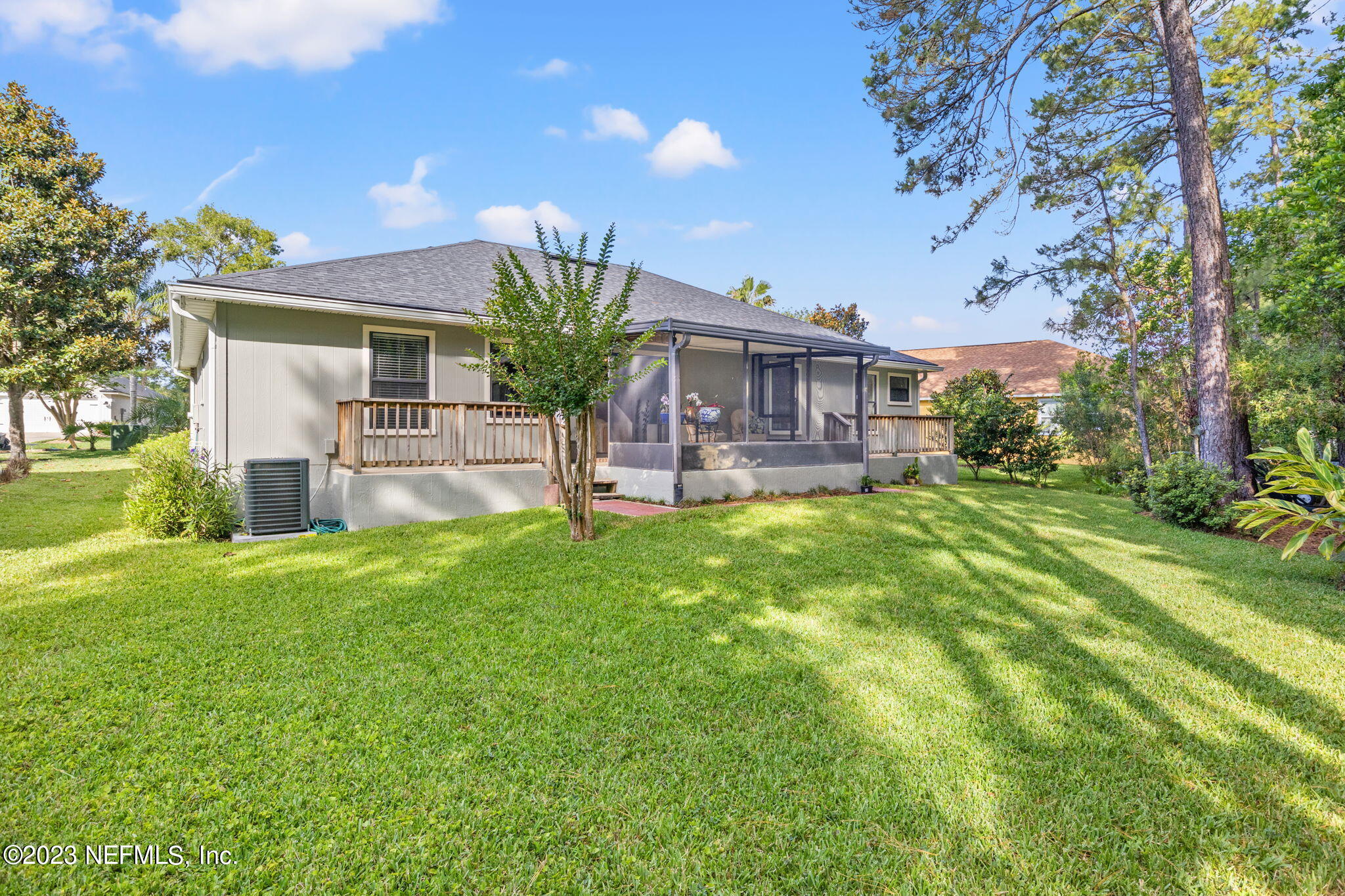 944 North Lilac Loop St. Johns, FL 32259 - Photo 24 of 32 a view of a house with a back yard