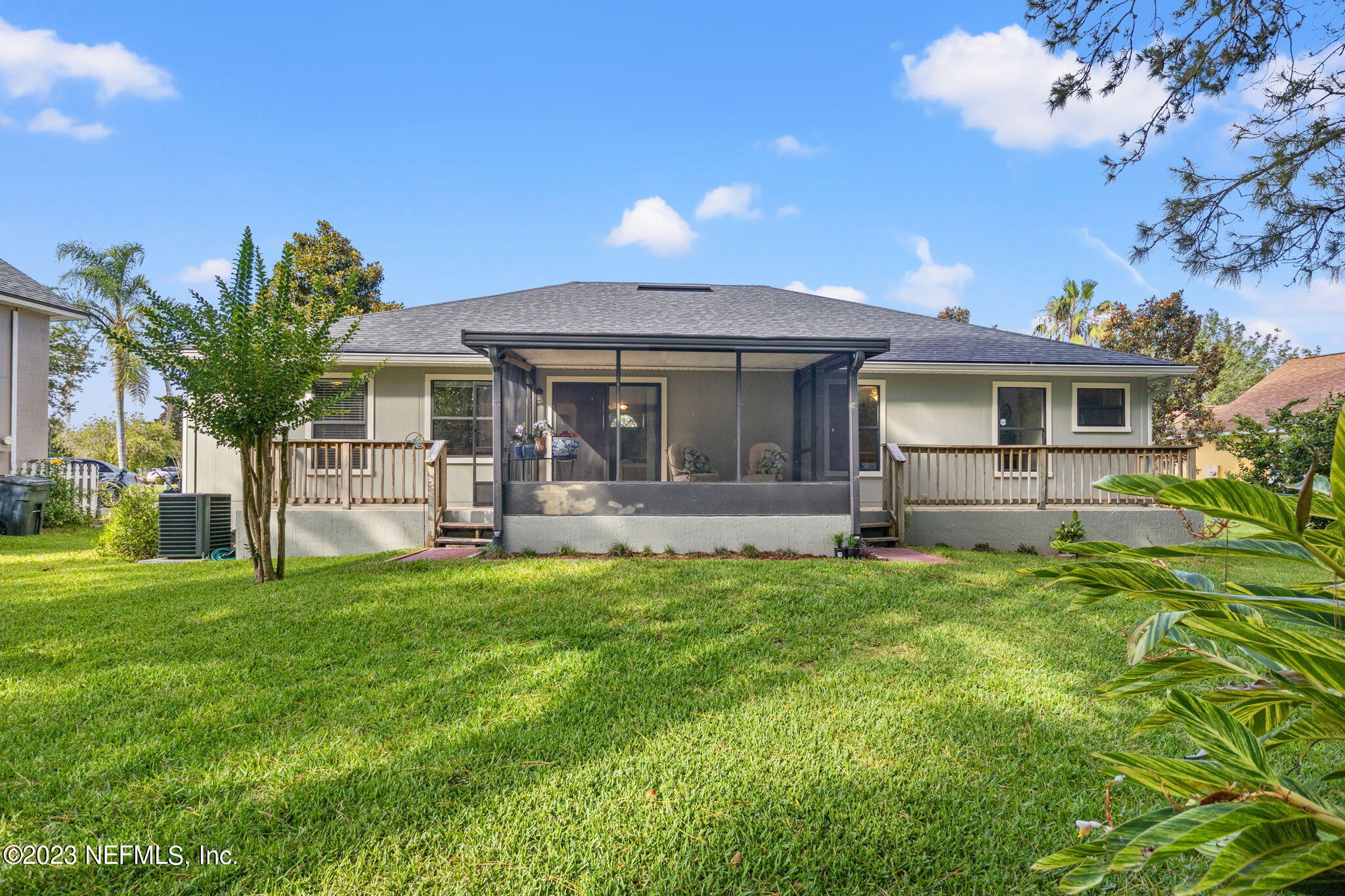 944 North Lilac Loop St. Johns, FL 32259 - Photo 27 of 32 a front view of a house with a yard