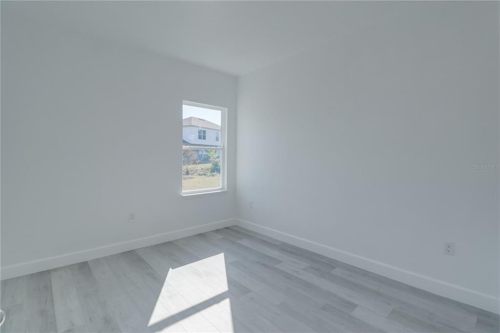 3110 Southwest 127th Lane Road Ocala, FL 34473 - Photo 12 of 17 an empty room with a window