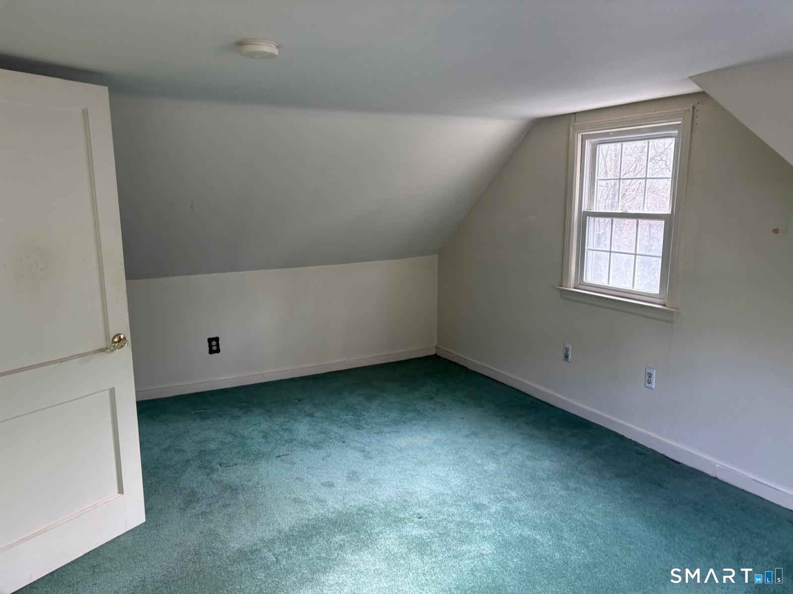 329 Bronson Road Fairfield, CT 06890 - Photo 14 of 25 an empty room with a window