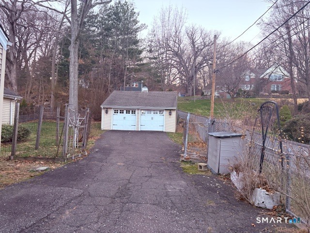 329 Bronson Road Fairfield, CT 06890 - Photo 22 of 25 a view of a park with iron fence