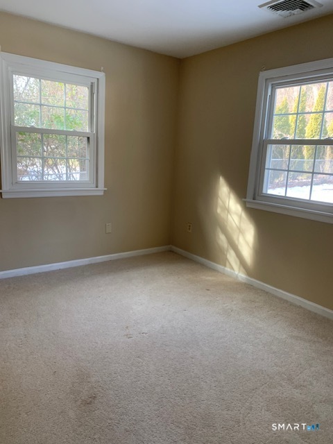 329 Bronson Road Fairfield, CT 06890 - Photo 10 of 25 an empty room with a window