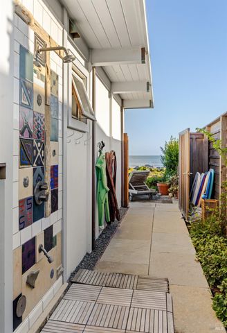 a view of a porch with seating space