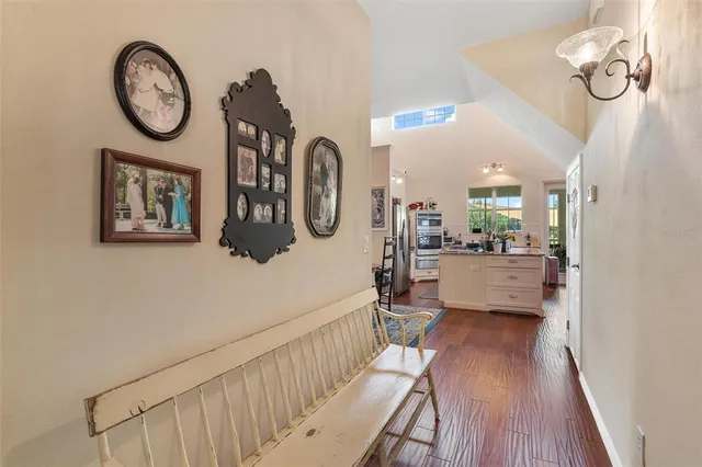 a living room with furniture fireplace and flat screen tv