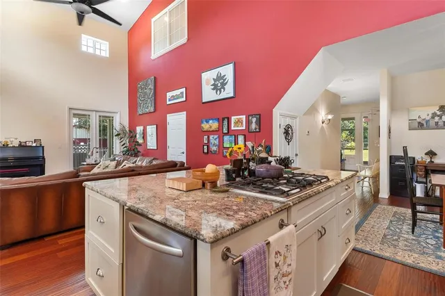 a view of a livingroom with workspace and a couch
