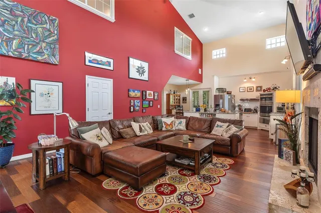 a view of a house with a yard and sitting area