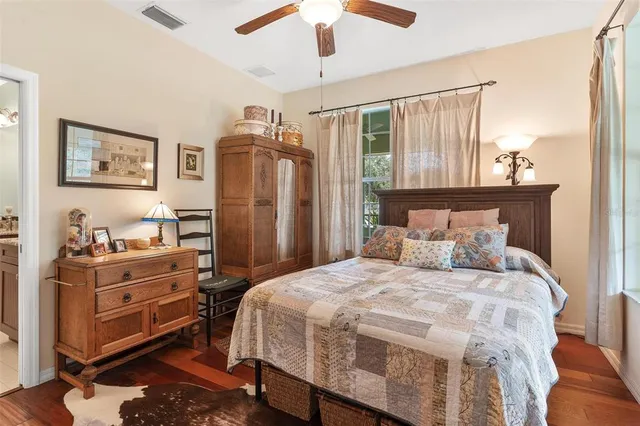 an aerial view of a house with garden space and street view