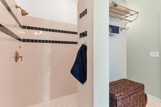 a view of a backyard with a garden and entertaining space