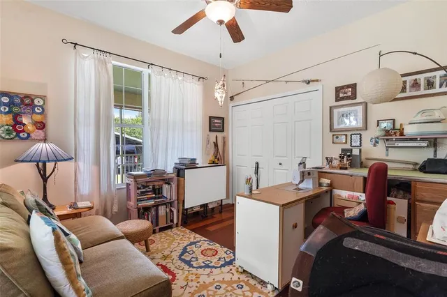a view of a house with a yard covered with snow in the background
