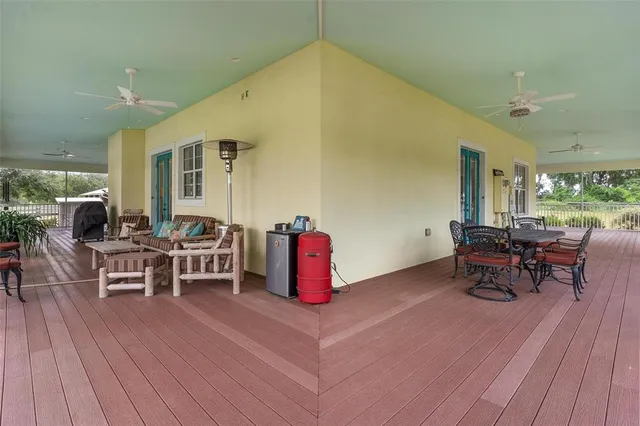 a front view of a house with a yard table and chairs
