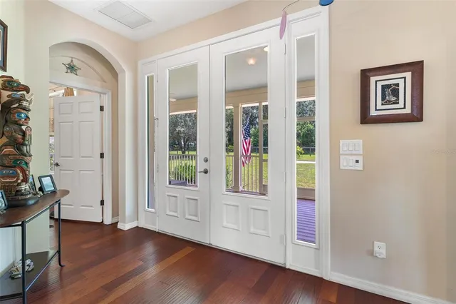 a bathroom with a tub sink and toilet
