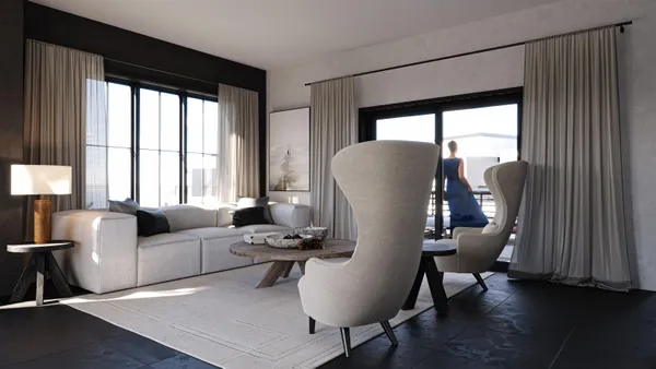 a living room with furniture and a window