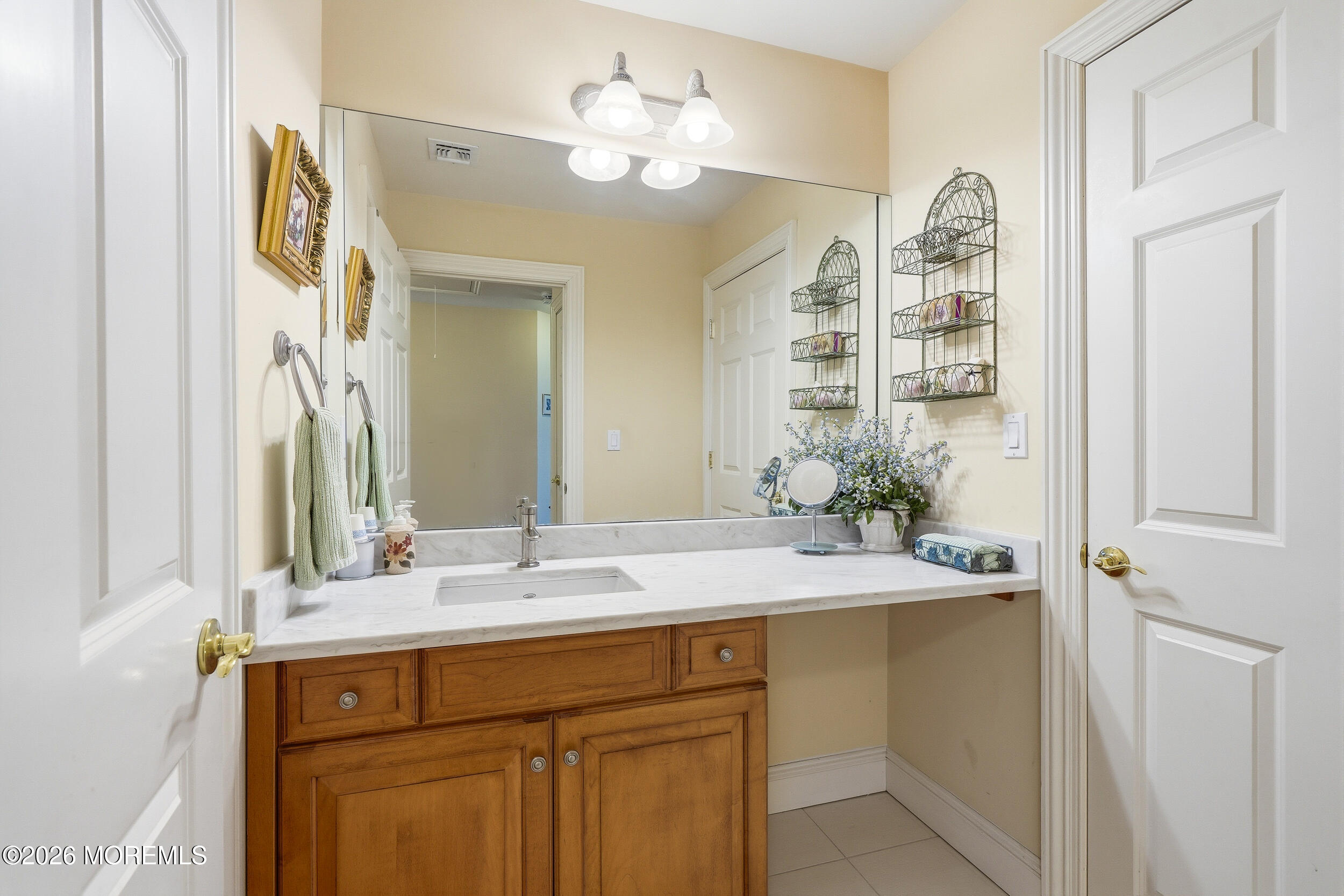478 Rickey Lane Long Branch, NJ 07740 - Photo 44 of 64 a bathroom with a sink and a mirror