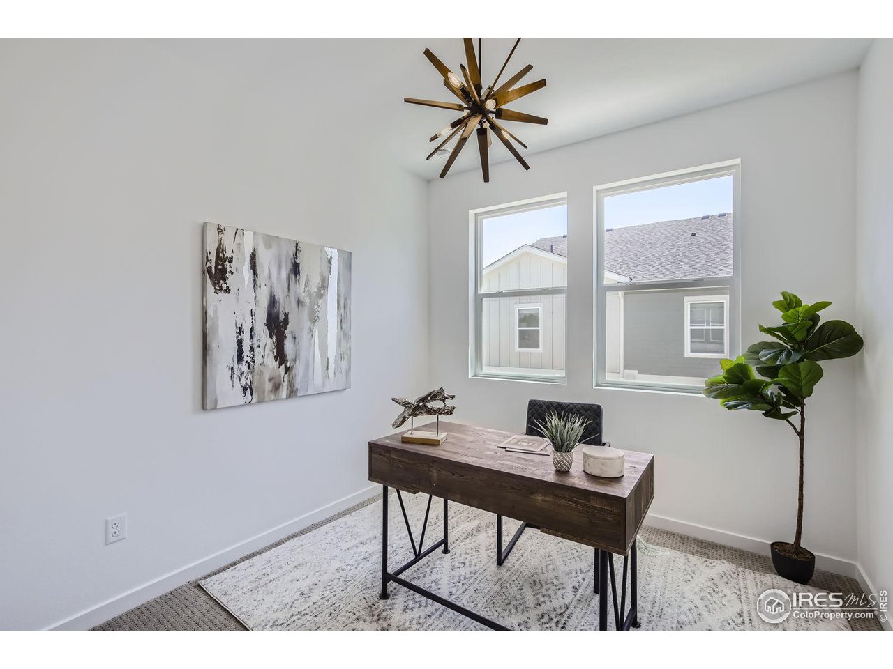 2721 Bear Springs Circle Longmont, CO 80503 - Photo 19 of 27 a workspace with furniture and window