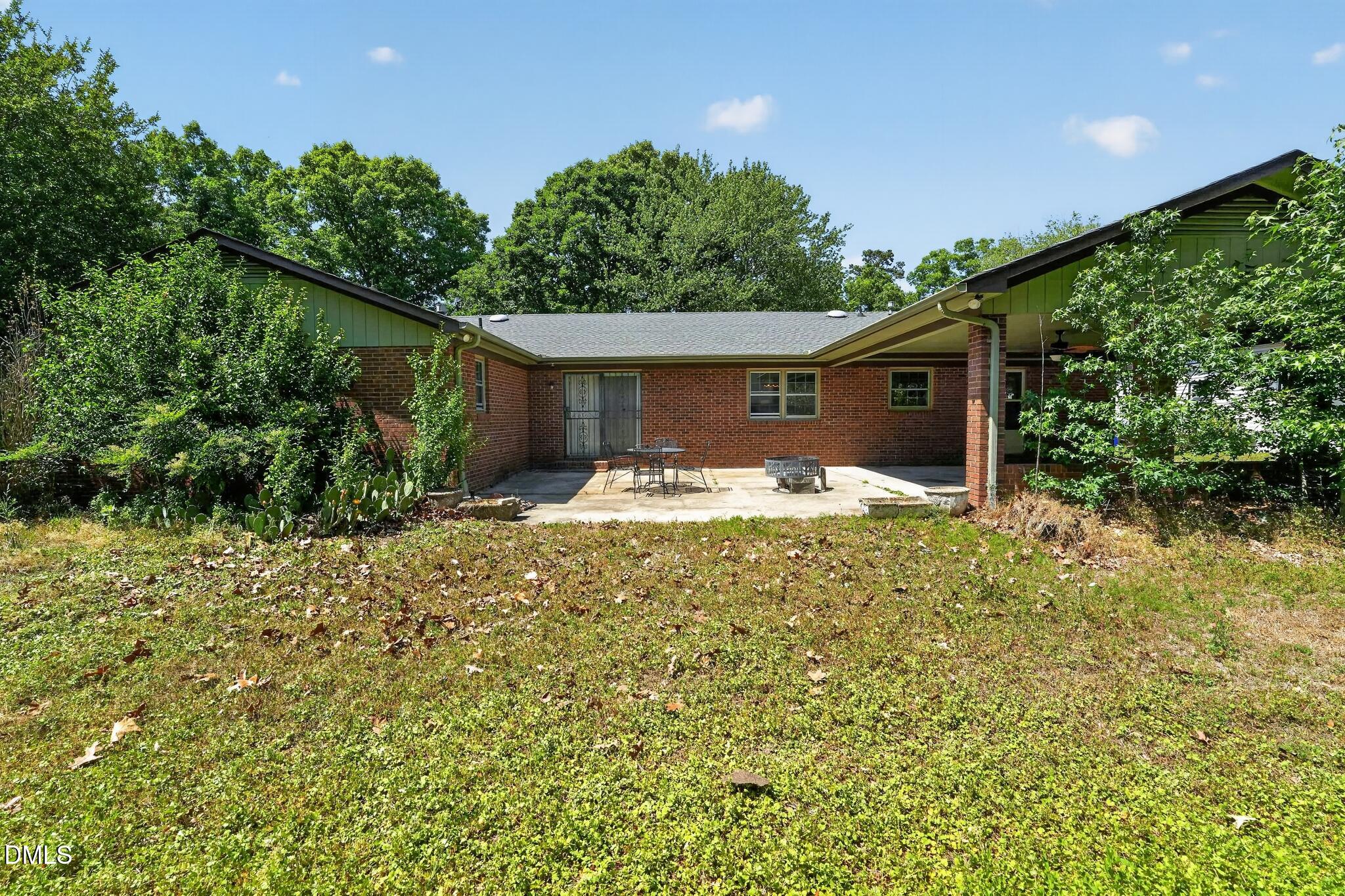 1034 Jerome Road Durham, NC 27713 - Photo 34 of 35 a front view of a house with garden