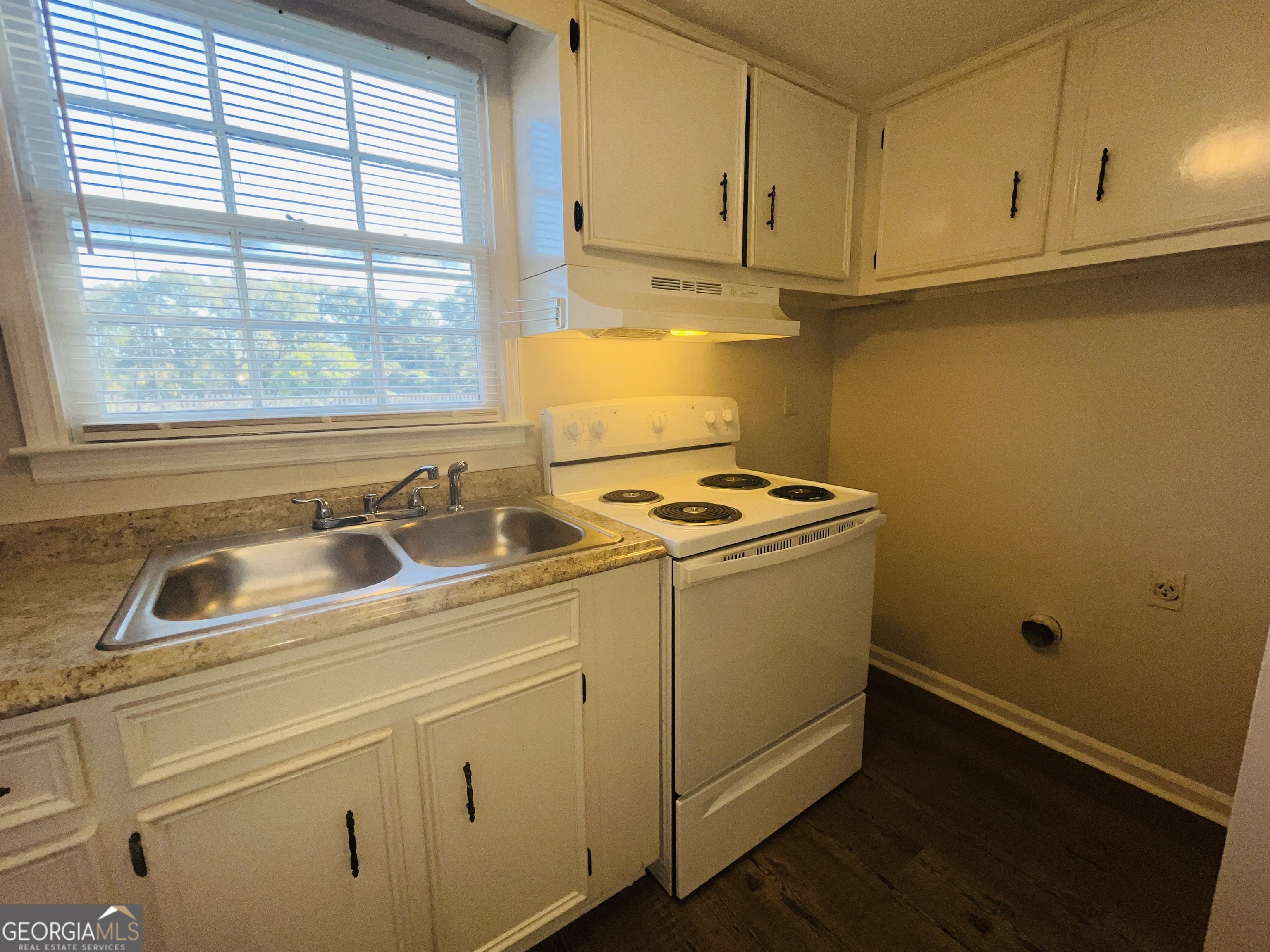 17 Curran Avenue, Unit A LaGrange, GA 30241 - Photo 13 of 25 a utility room with dryer and washer