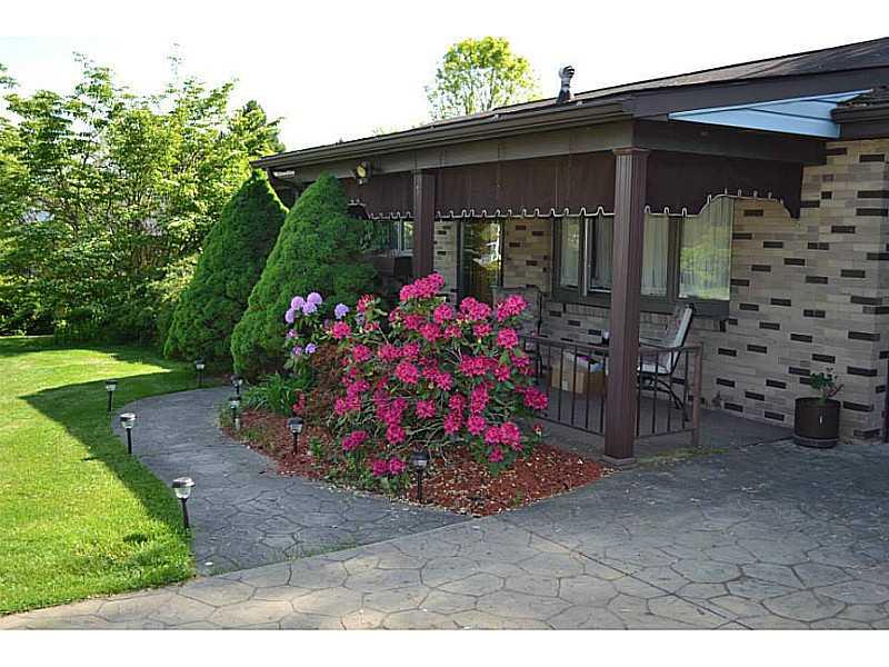 Exterior Front. Level Walkway into Home and Garage!