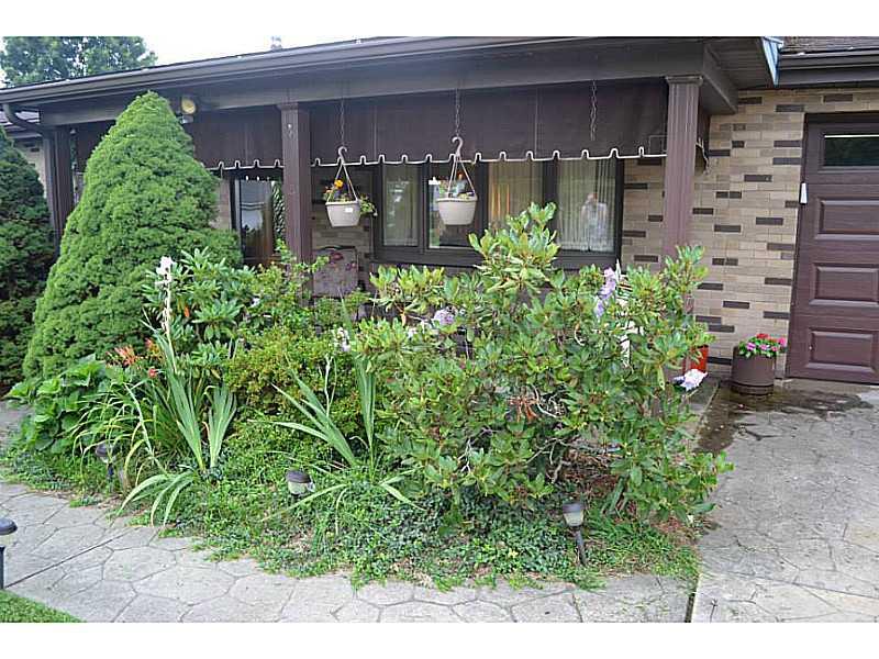 Exterior Front. Nicely Landscaped Exterior!