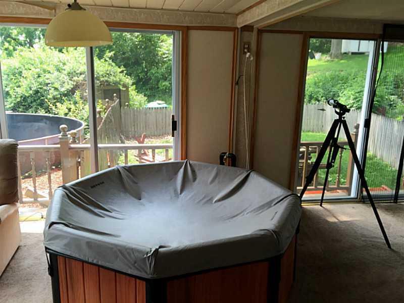 1128 Butler Road Springdale, PA 15144 - Photo 10 of 20 Family Room. Family Room w/Hot Tub!