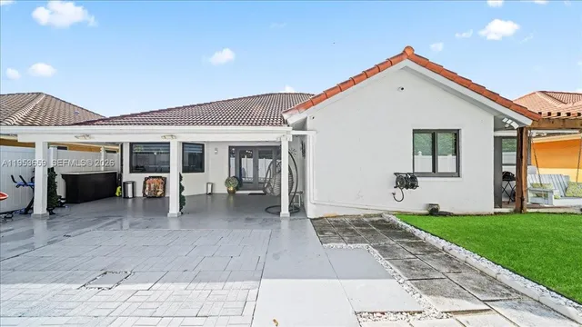a house view with a outdoor space