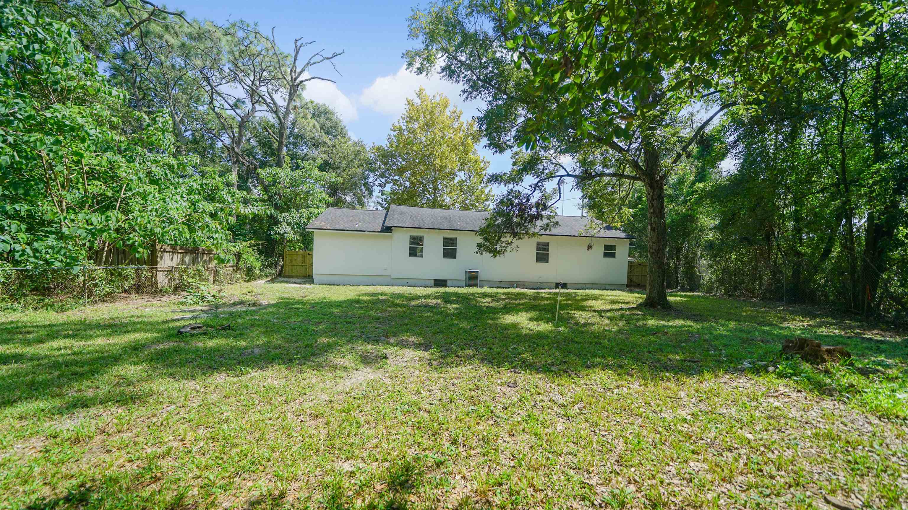 11734 Wynell Road Jacksonville, FL 32218 - Photo 22 of 27 a view of a house with a backyard