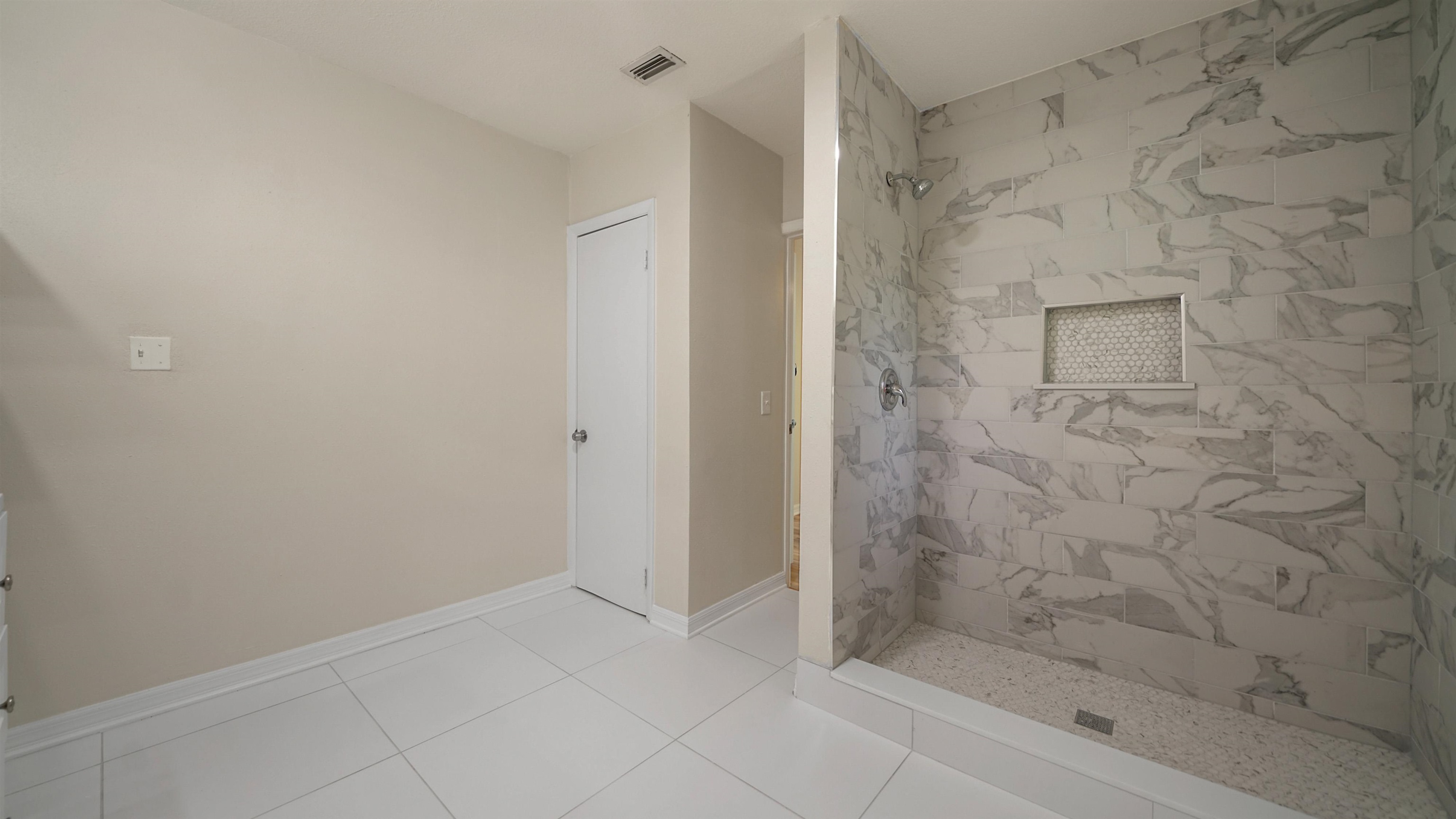 11734 Wynell Road Jacksonville, FL 32218 - Photo 10 of 27 a bathroom with a shower