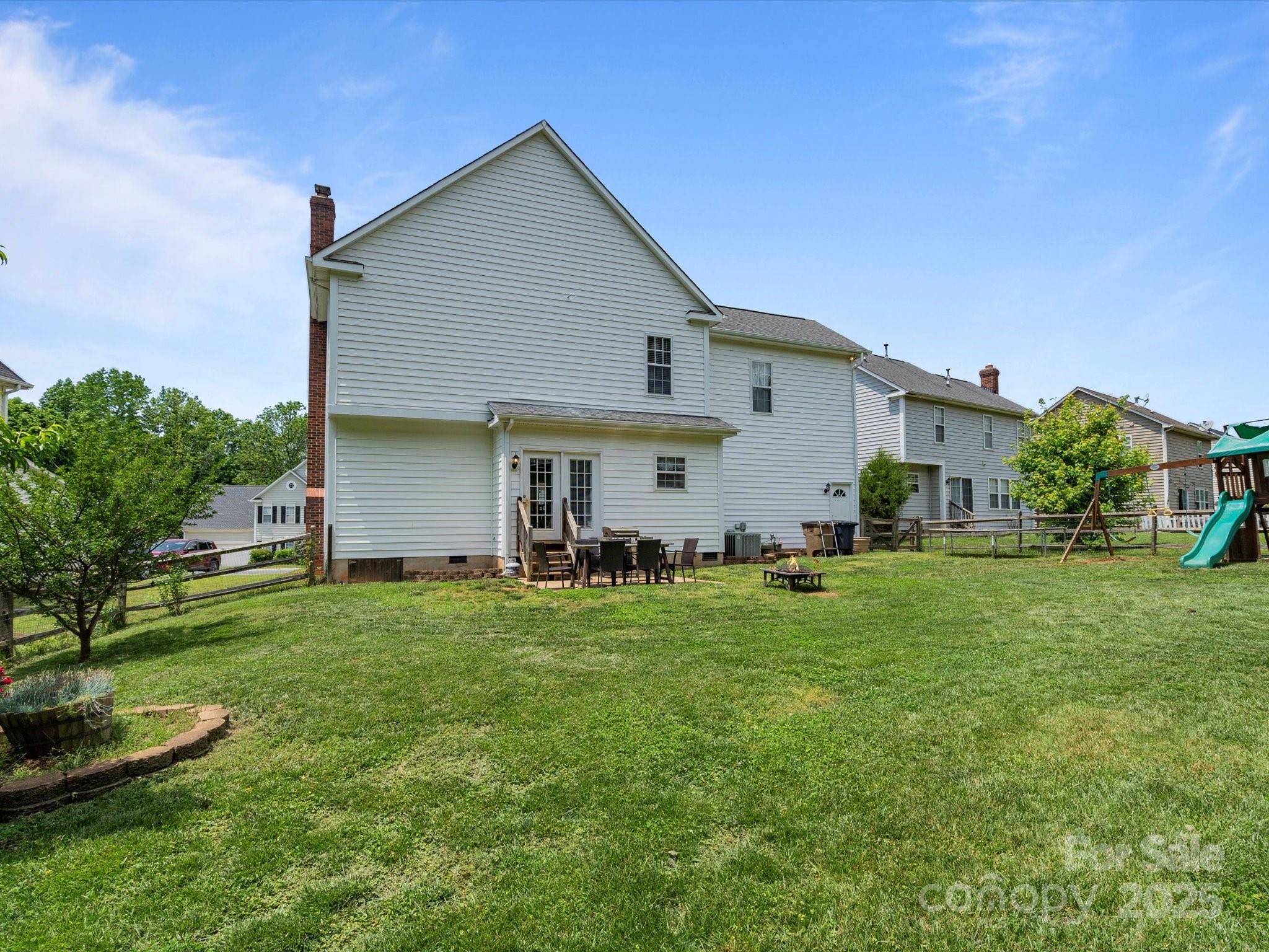 5535 Whispering Wind Lane Indian Trail, NC 28079 - Photo 23 of 25 a view of a yard in front of house