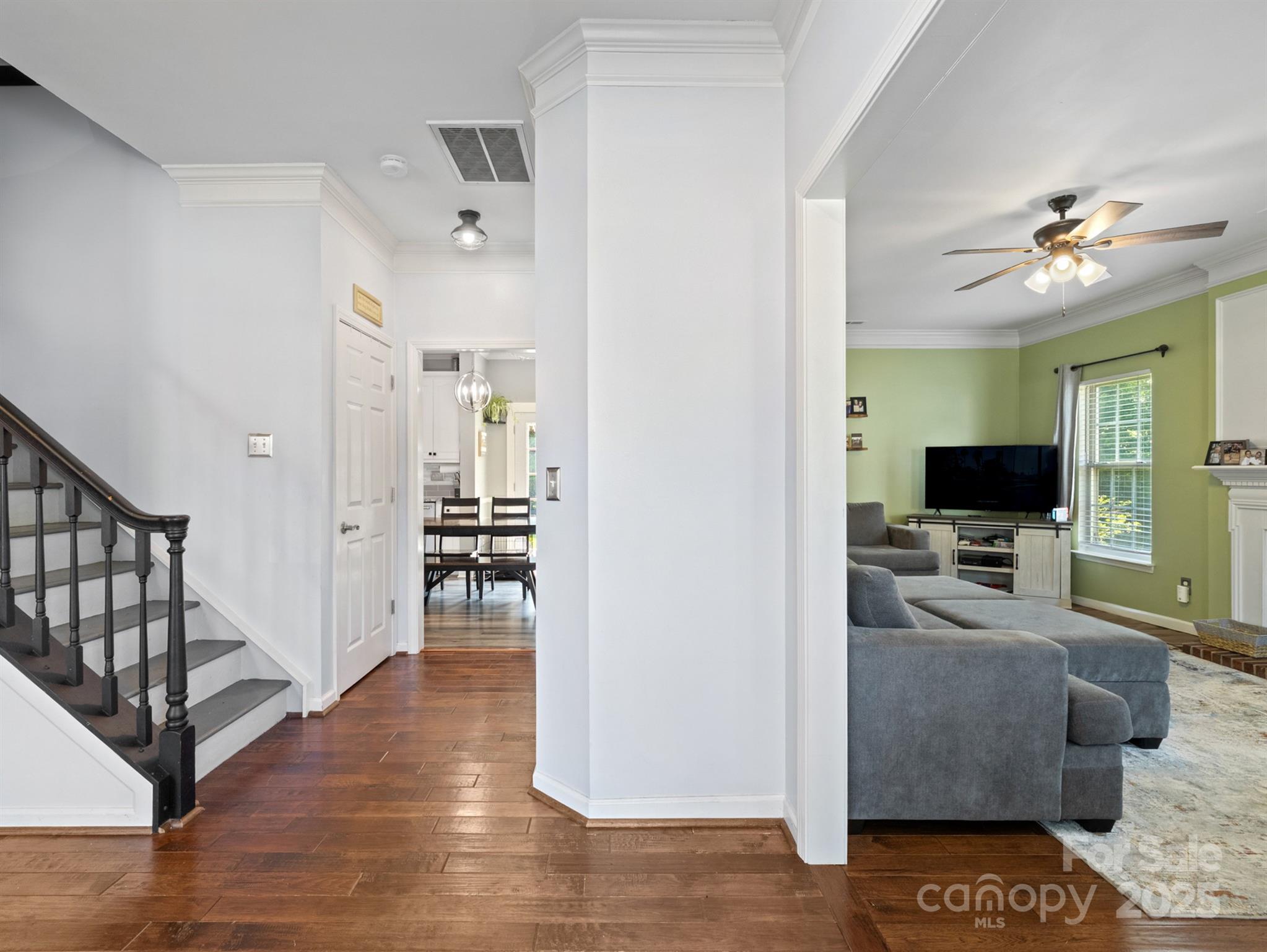 5535 Whispering Wind Lane Indian Trail, NC 28079 - Photo 3 of 25 a living room with furniture and a flat screen tv