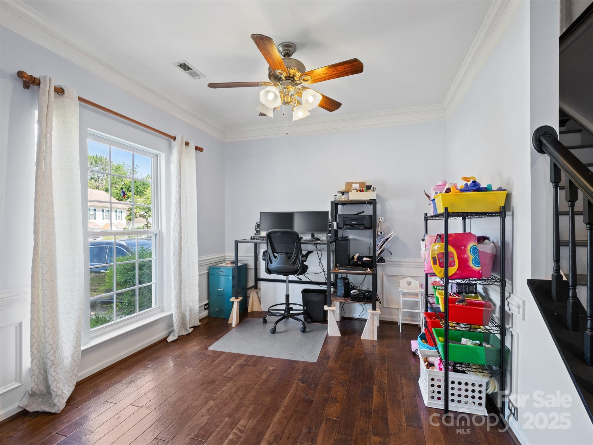 5535 Whispering Wind Lane Indian Trail, NC 28079 - Photo 4 of 25 a view of a work space with furniture and wooden floor