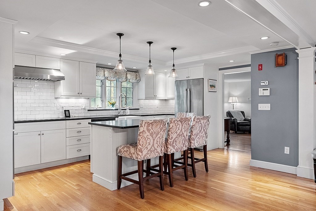 2 Joseph Reed Lane Acton, MA 01720 - Photo 11 of 42 a kitchen with refrigerator and cabinets
