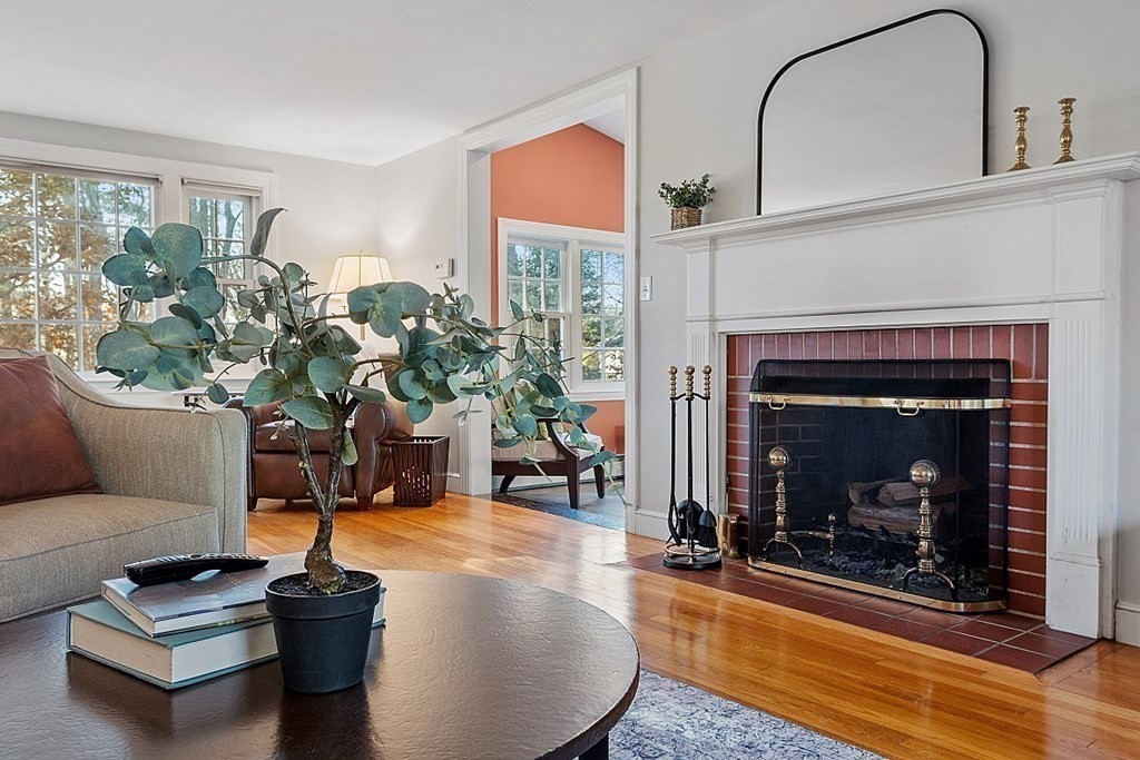 2 Joseph Reed Lane Acton, MA 01720 - Photo 13 of 42 a living room with furniture and a fireplace