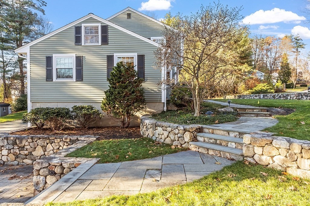 2 Joseph Reed Lane Acton, MA 01720 - Photo 2 of 42 a front view of a house with garden