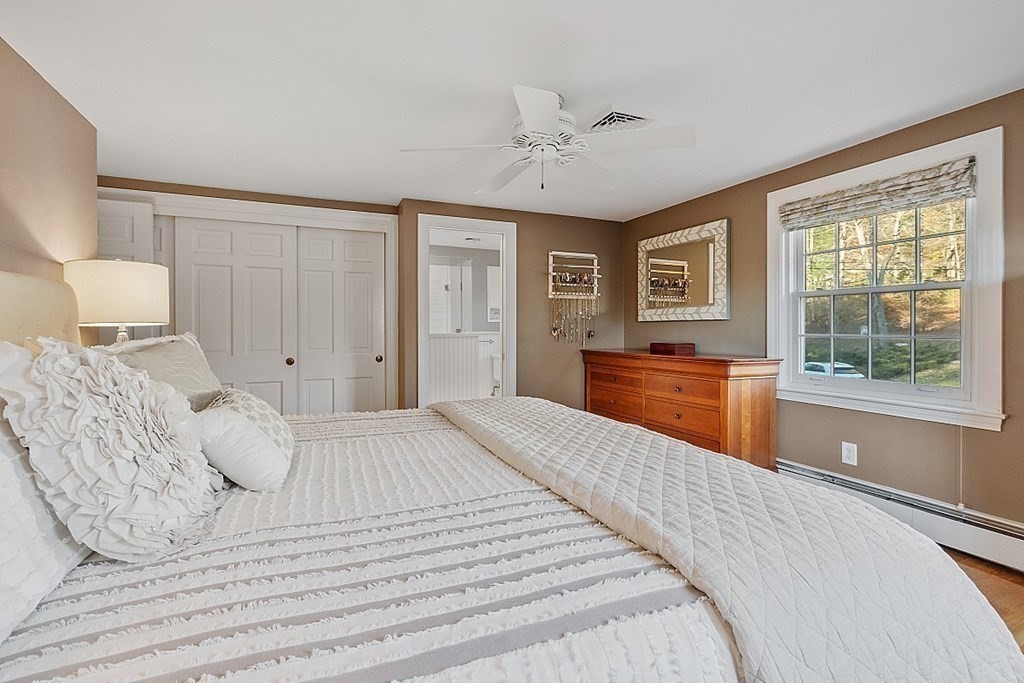 2 Joseph Reed Lane Acton, MA 01720 - Photo 23 of 42 a bedroom with a large bed and a window
