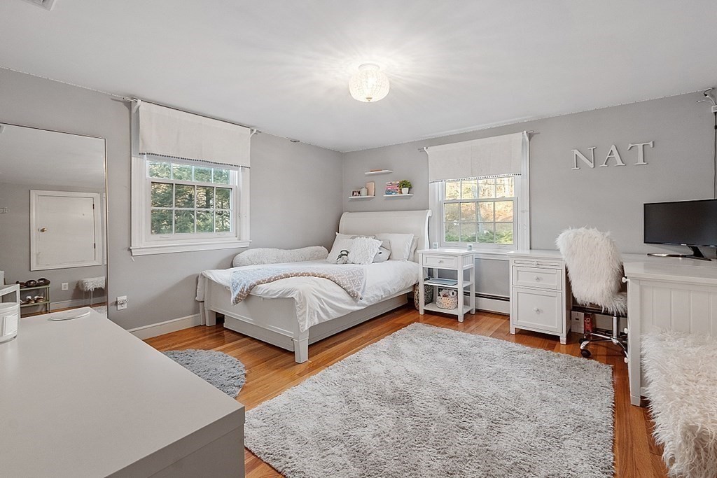 2 Joseph Reed Lane Acton, MA 01720 - Photo 25 of 42 a bedroom with a bed wooden floor and window