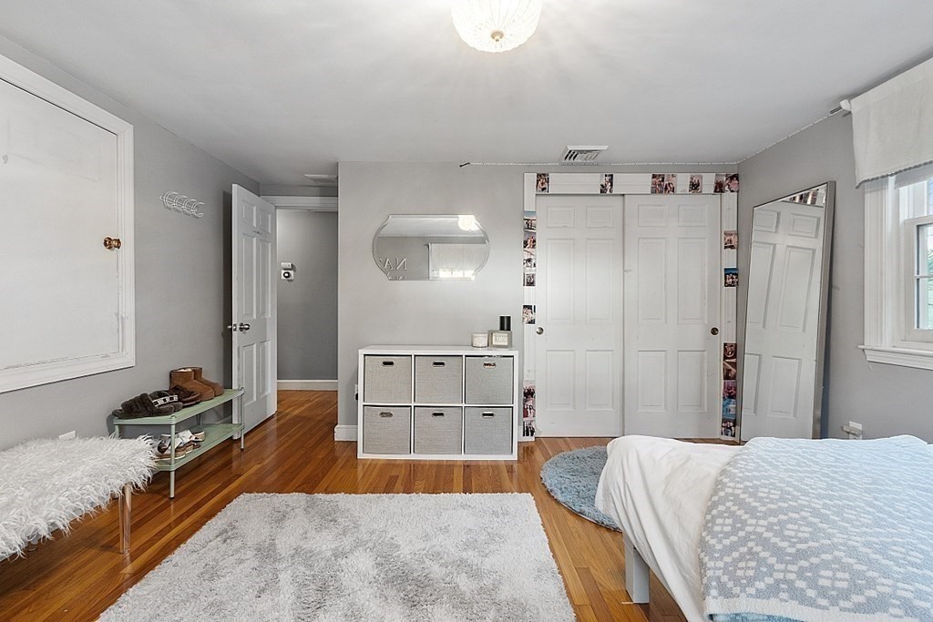 2 Joseph Reed Lane Acton, MA 01720 - Photo 26 of 42 a bedroom with a bed and a view of living room