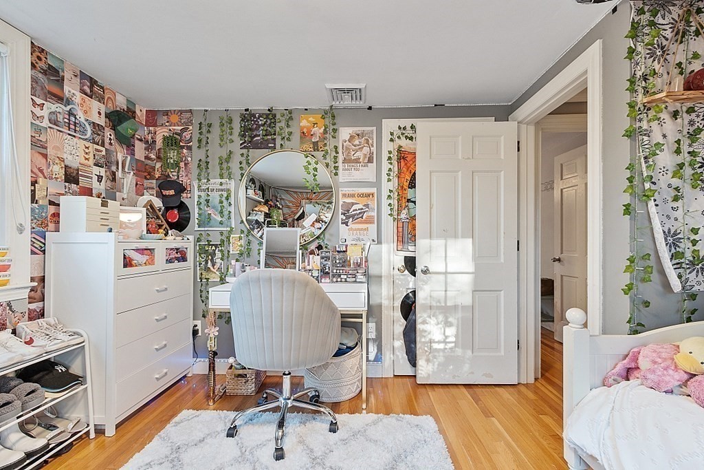 2 Joseph Reed Lane Acton, MA 01720 - Photo 27 of 42 a view of a livingroom with workspace and a window
