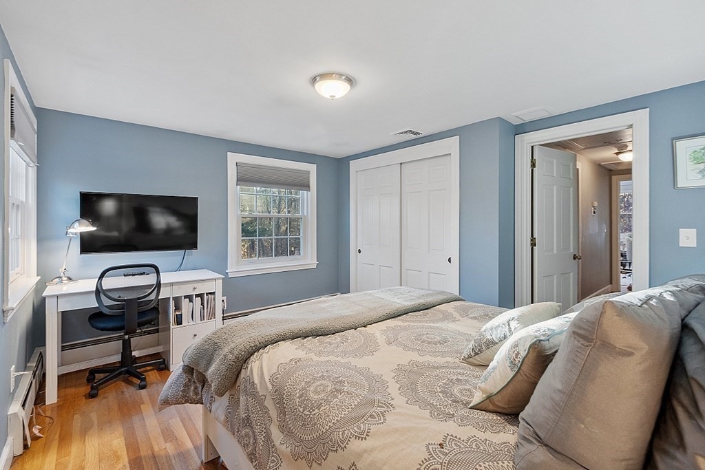 2 Joseph Reed Lane Acton, MA 01720 - Photo 30 of 42 a bedroom with a bed and a flat screen tv