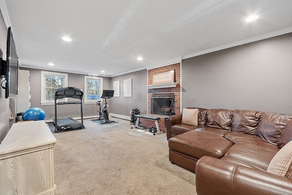 2 Joseph Reed Lane Acton, MA 01720 - Photo 32 of 42 a living room with furniture and a couch