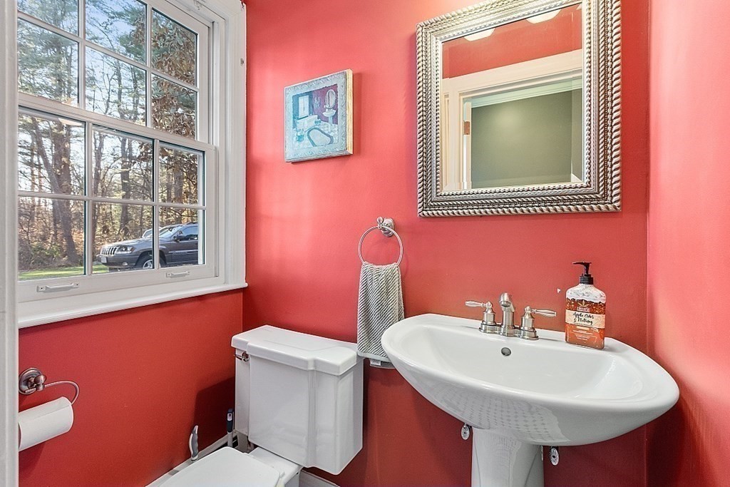 2 Joseph Reed Lane Acton, MA 01720 - Photo 34 of 42 a bathroom with a sink a toilet and a mirror