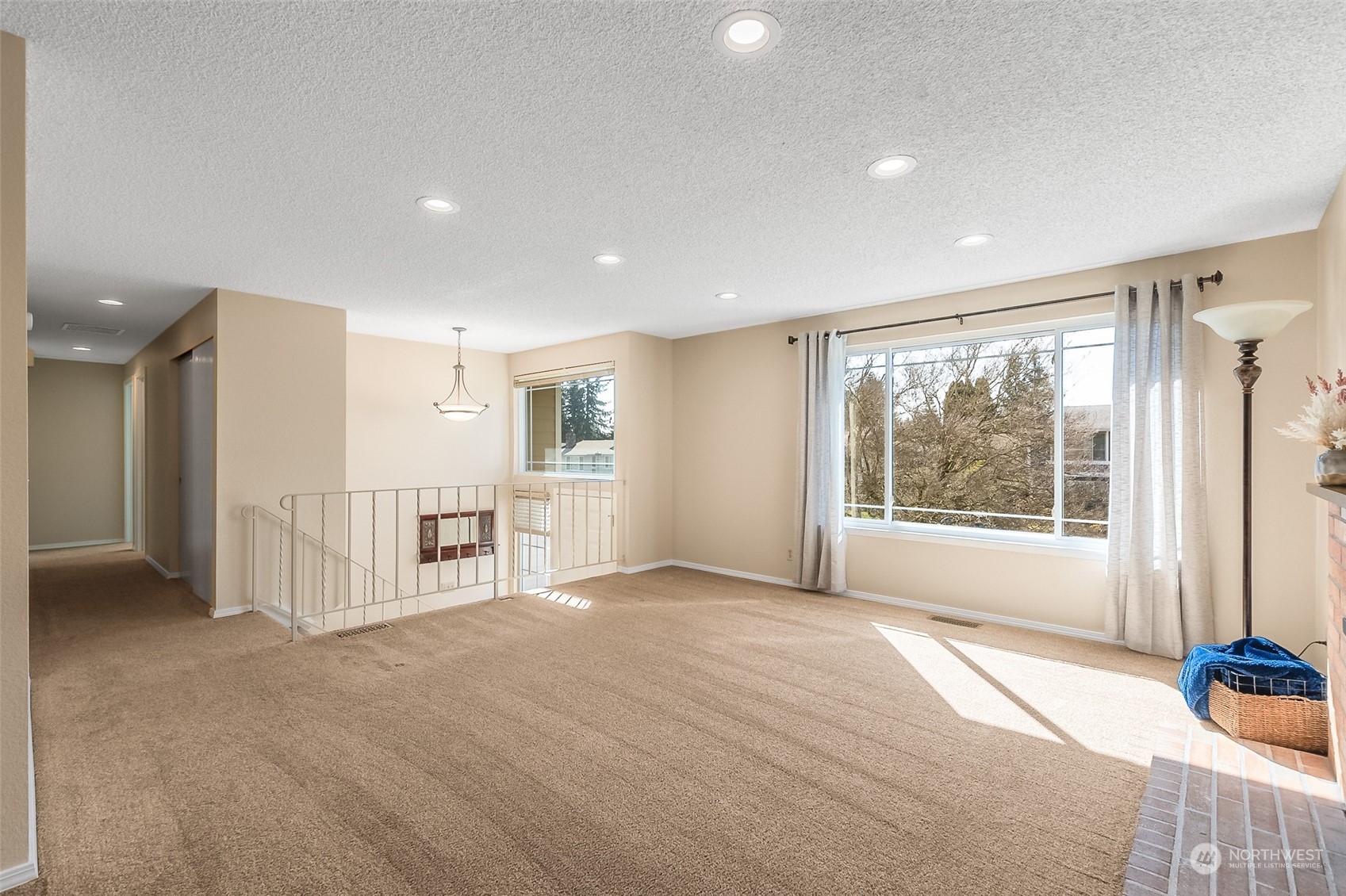 4320 Northeast 24th Street Renton, WA 98059 - Photo 5 of 34 a view of an empty room with a window