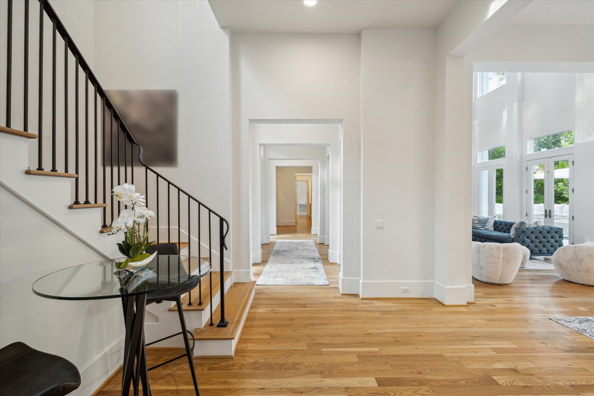22 East Shady Lane, Unit E Houston, TX 77063 - Photo 27 of 50 a view of entryway and hall with wooden floor