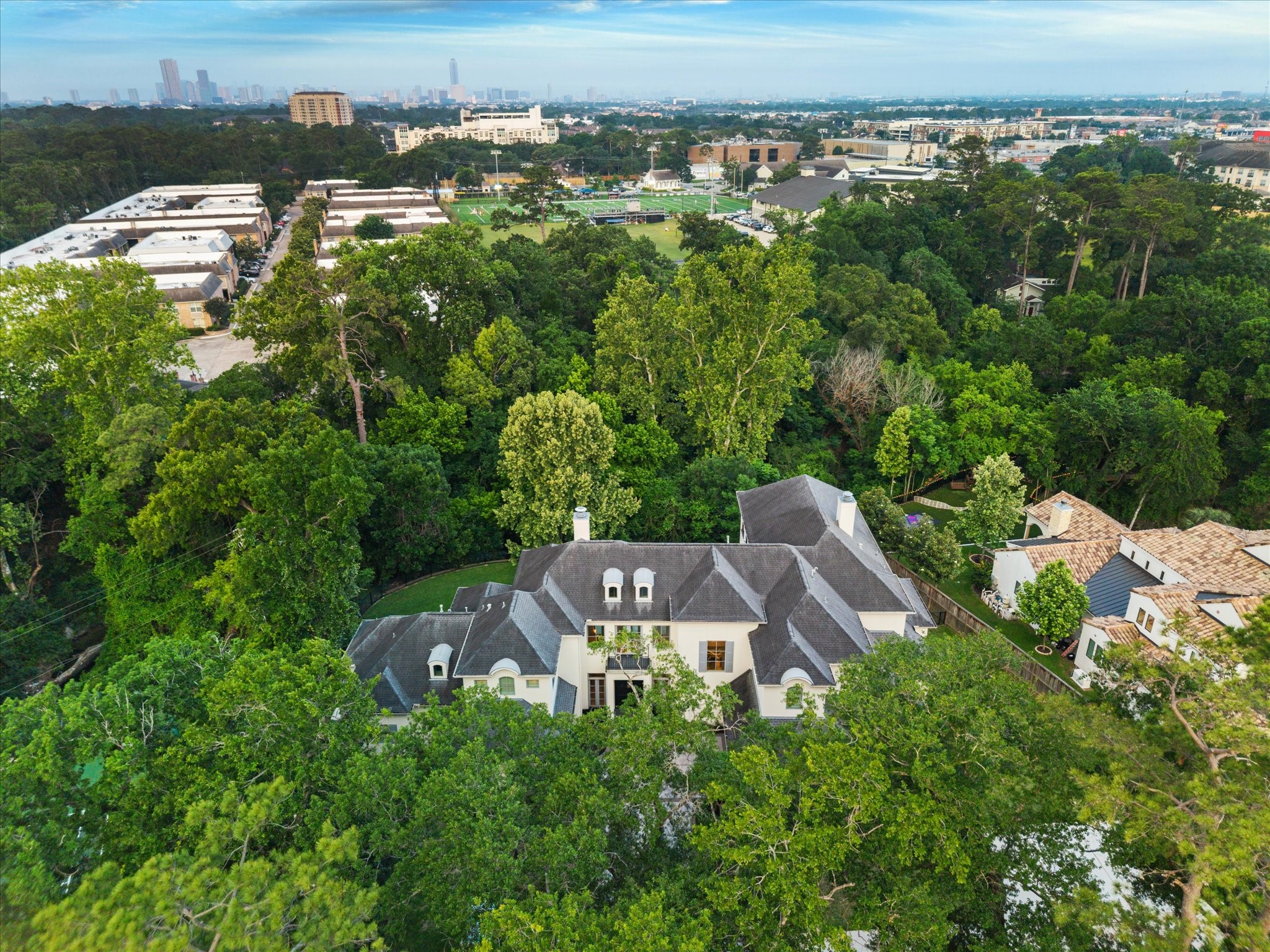 22 East Shady Lane, Unit E Houston, TX 77063 - Photo 49 of 50 an aerial view of a house with a yard