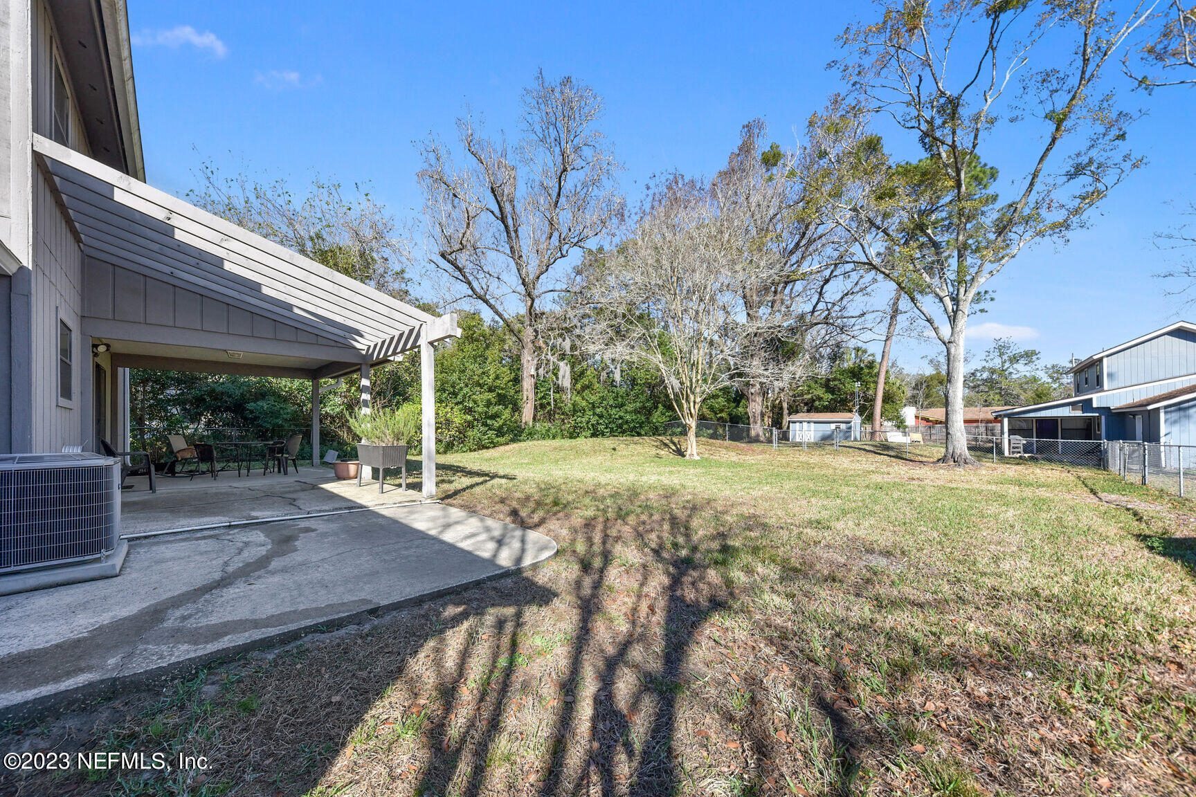 5327 Bedford Road Jacksonville, FL 32207 - Photo 14 of 16 a view of a yard with plants and trees