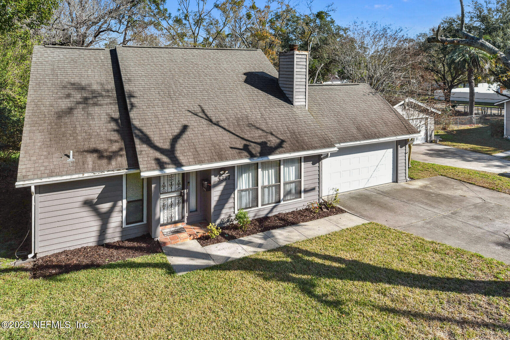 5327 Bedford Road Jacksonville, FL 32207 - Photo 16 of 16 a view of a house with backyard